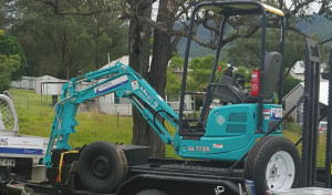 kobelco mini excavator on the trailer